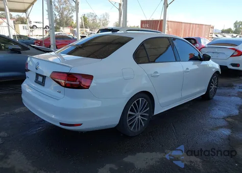 2016 Volkswagen Jetta 1.8T Sport z USA, uszkodzony, nr VIN 3VWD17AJXGM345538